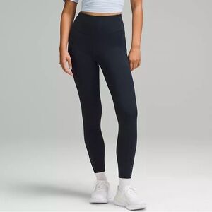 Lululemon Fast and Furious leggings. Navy. Size 6, 25”. Waist 27” hip 37”